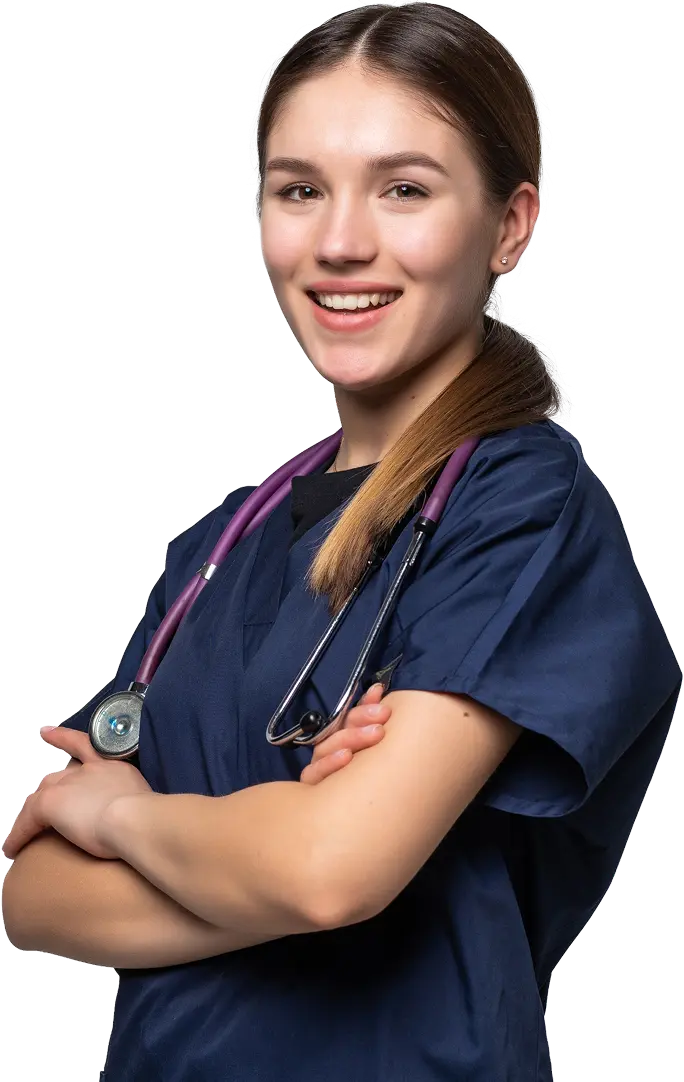 Female nurse in dark blue scrubs smiling at the camera